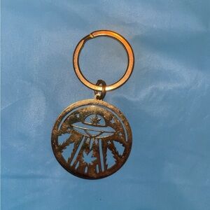 Golden spaceship pot leaf keychain